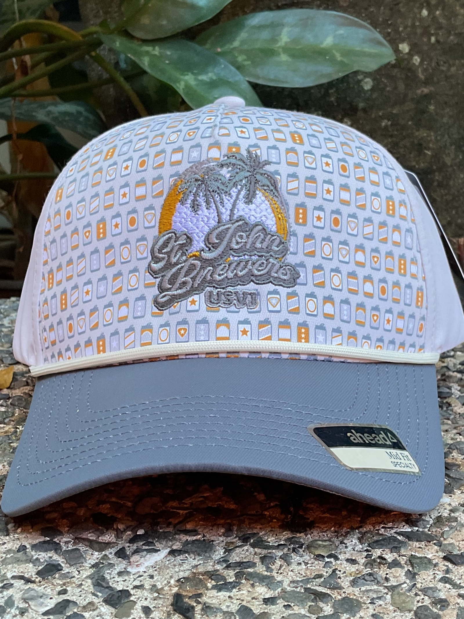 Cap with St. John's Brewers logo on a textured surface